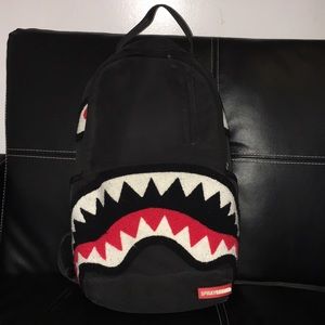 Spray ground book bag
